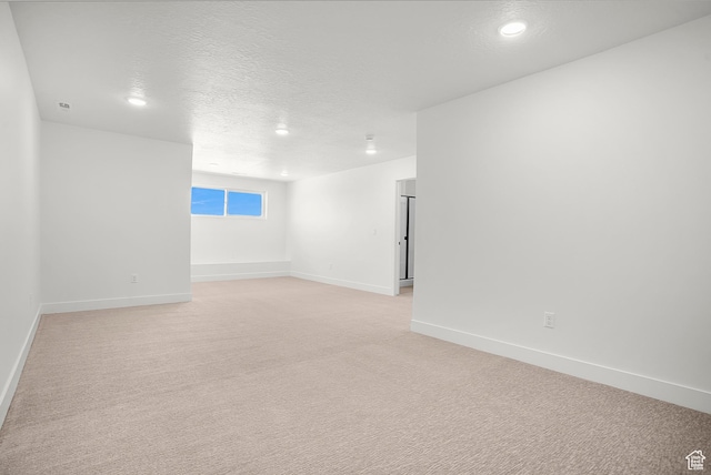 1631 W Century Ln Unit A, Mapleton, UT 84664 - empty room featuring baseboards, light colored carpet, recessed lighting, and a textured ceiling