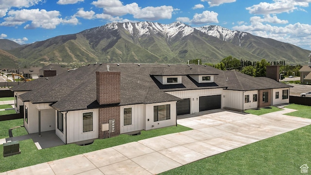 1631 W Century Ln Unit A, Mapleton, UT 84664 - view of front of property featuring board and batten siding, a shingled roof, driveway, and a mountain view