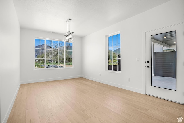 1631 W Century Ln Unit A, Mapleton, UT 84664 - empty room featuring light wood-style floors and baseboards