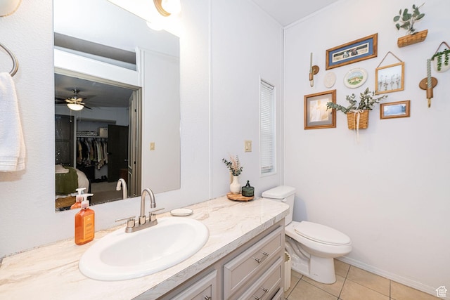 1935 S 1250 W, Logan, UT 84321 - bathroom featuring tile patterned floors, vanity, toilet, and a ceiling fan