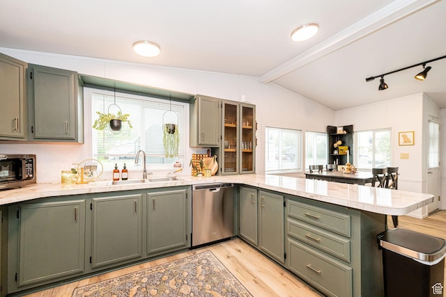 1935 S 1250 W, Logan, UT 84321 - kitchen with stainless steel appliances, a peninsula, light wood finished floors, and light countertops