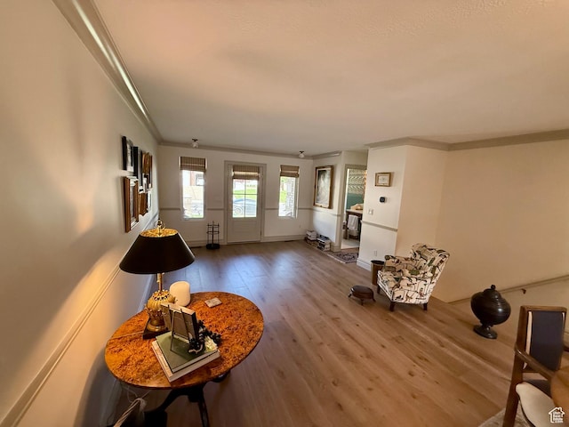 1367 N Brookhurst Cir, Centerville, UT 84014 - living room featuring wood finished floors, ornamental molding, and baseboards