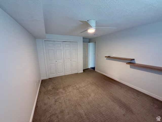 1367 N Brookhurst Cir, Centerville, UT 84014 - unfurnished bedroom featuring baseboards, a textured ceiling, carpet flooring, a closet, and ceiling fan