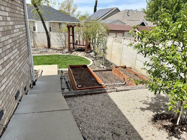 1367 N Brookhurst Cir, Centerville, UT 84014 - fenced yard with a garden