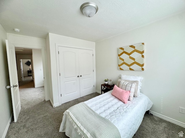 5062 W Valmont Way, Herriman, UT 84096 - bedroom featuring carpet, a closet, a textured ceiling, and baseboards