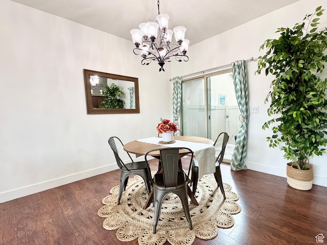 5062 W Valmont Way, Herriman, UT 84096 - dining space with baseboards, a chandelier, and dark wood-style flooring