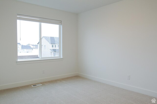 757 E 1250 S, Hyrum, UT 84319 - unfurnished room with healthy amount of natural light, carpet, and baseboards