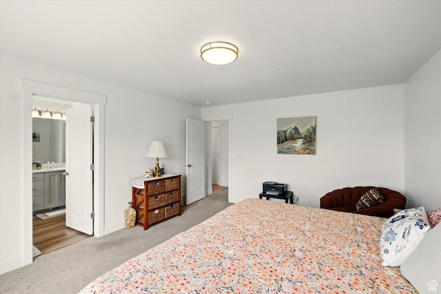 1412 W 1920 S, Logan, UT 84321 - carpeted bedroom with ensuite bathroom and baseboards