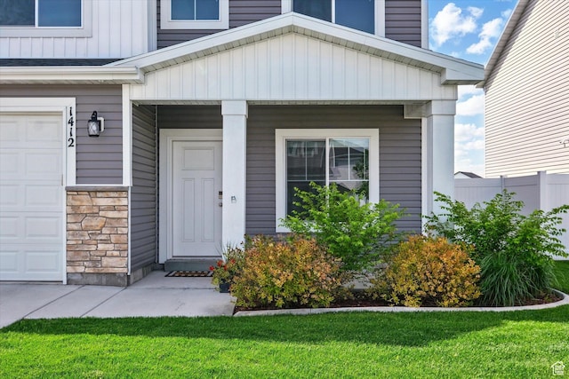 1412 W 1920 S, Logan, UT 84321 - doorway to property featuring a garage and stone siding