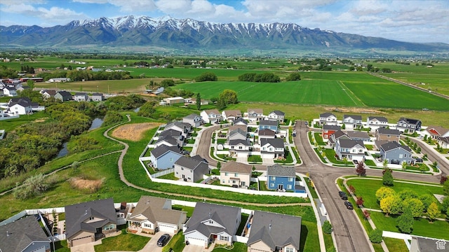 1412 W 1920 S, Logan, UT 84321 - aerial view of residential area featuring a mountainous background