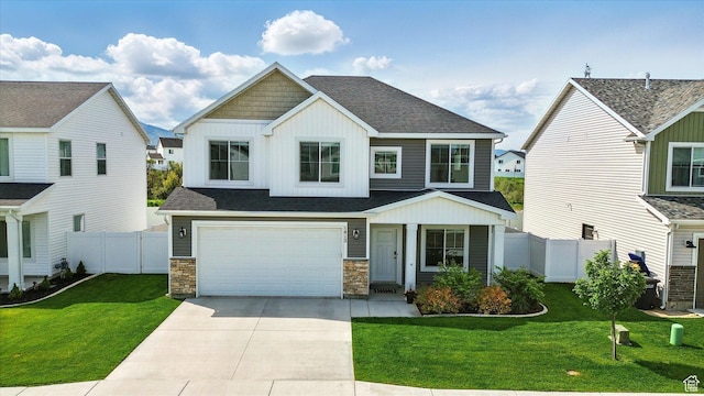 1412 W 1920 S, Logan, UT 84321 - view of front of property featuring board and batten siding, driveway, a garage, stone siding, and roof with shingles