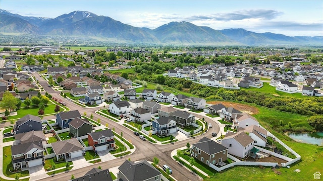 1412 W 1920 S, Logan, UT 84321 - aerial view of residential area featuring a mountainous background
