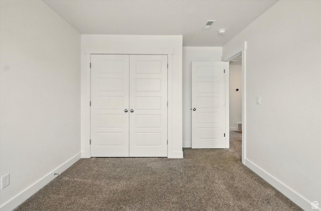 1412 W 1920 S, Logan, UT 84321 - unfurnished bedroom with carpet flooring, a closet, and baseboards