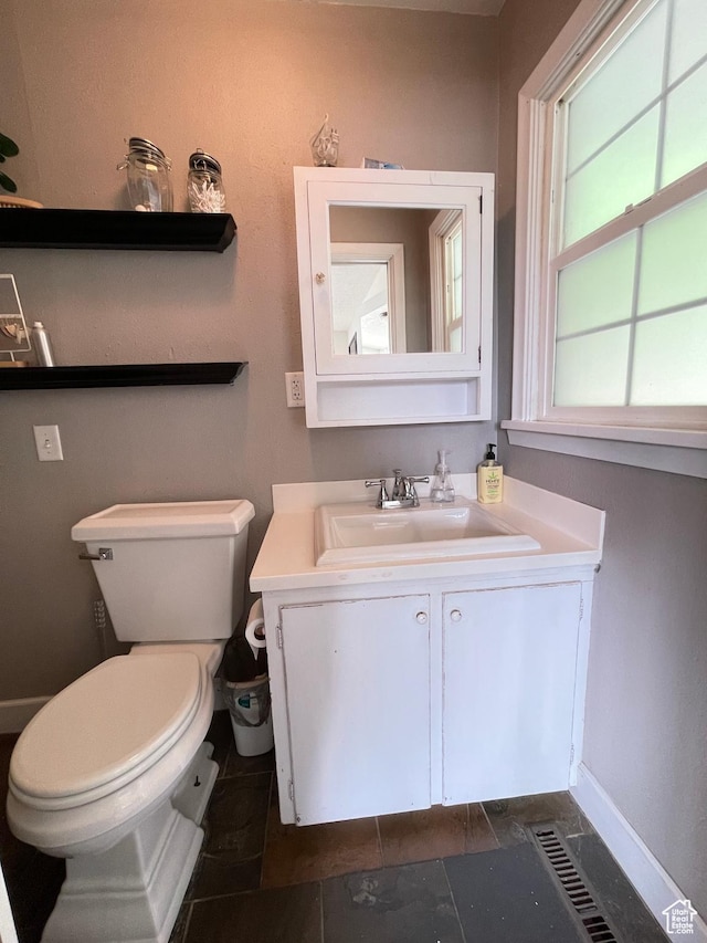 578 S 1500 W, Vernal, UT 84078 - bathroom with toilet, vanity, and baseboards