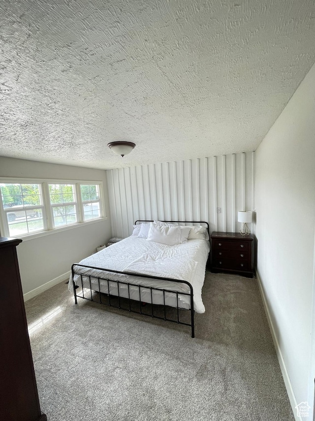 578 S 1500 W, Vernal, UT 84078 - carpeted bedroom with a textured ceiling and baseboards