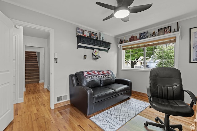 312 E 1st S, Preston, ID 83263 - home office with light wood-style flooring, a ceiling fan, and baseboards