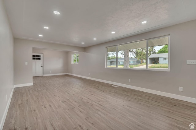 4098 W 5580 S, Salt Lake City, UT 84118 - unfurnished room with baseboards, wood finished floors, and recessed lighting