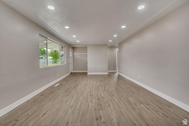 4098 W 5580 S, Salt Lake City, UT 84118 - empty room featuring recessed lighting, wood finished floors, and baseboards