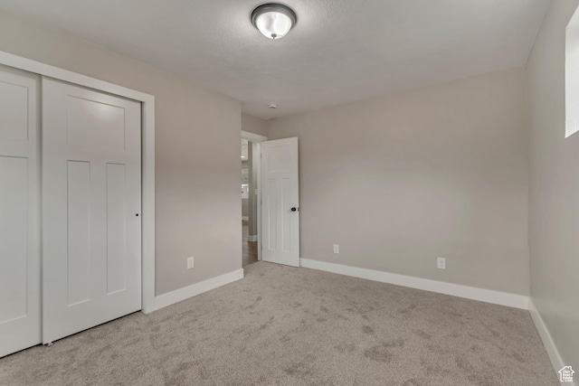 4098 W 5580 S, Salt Lake City, UT 84118 - unfurnished bedroom featuring carpet floors, baseboards, and a closet