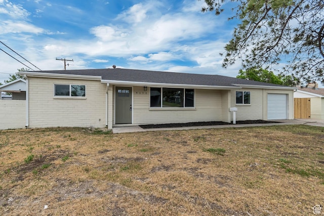 4098 W 5580 S, Salt Lake City, UT 84118 - ranch-style home featuring brick siding and a garage