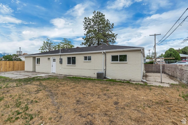 4098 W 5580 S, Salt Lake City, UT 84118 - back of property featuring a patio area and central AC unit