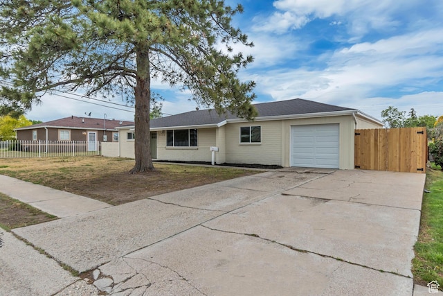 4098 W 5580 S, Salt Lake City, UT 84118 - ranch-style house featuring a garage and concrete driveway