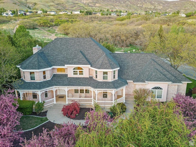 14 N 1025 E, Lindon, UT 84042 - back of property with a chimney, a porch, and roof with shingles