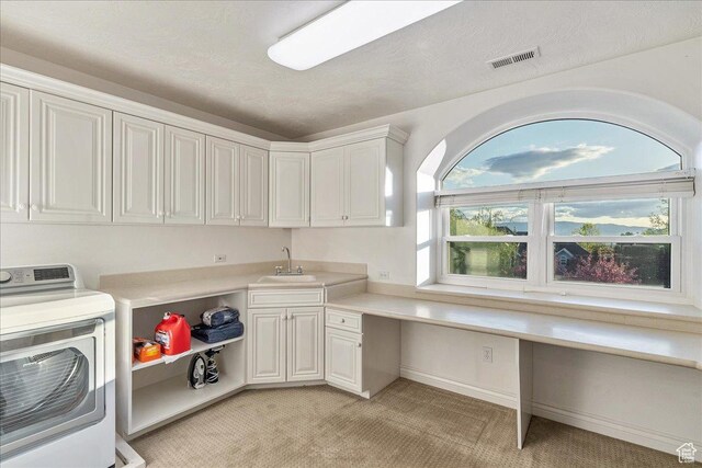 14 N 1025 E, Lindon, UT 84042 - washroom featuring washer / clothes dryer, light carpet, healthy amount of natural light, and cabinet space