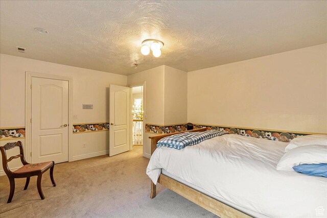 14 N 1025 E, Lindon, UT 84042 - bedroom featuring light carpet, baseboards, and a textured ceiling