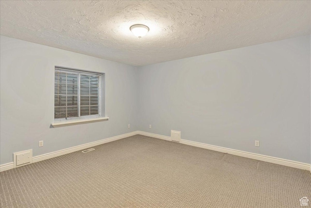 14 N 1025 E, Lindon, UT 84042 - spare room featuring carpet, baseboards, and a textured ceiling