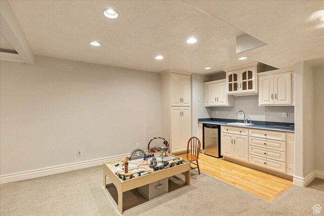 14 N 1025 E, Lindon, UT 84042 - kitchen featuring dishwasher, a sink, light colored carpet, recessed lighting, and baseboards