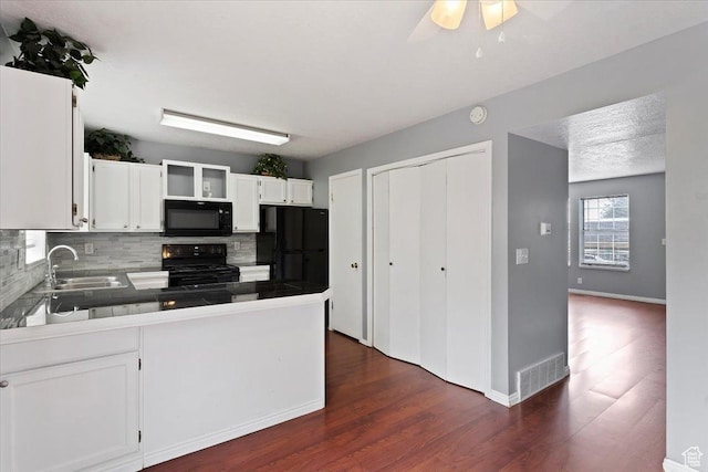 1464 S 1650 E, Ogden, UT 84404 - kitchen with black appliances, a sink, backsplash, and a peninsula