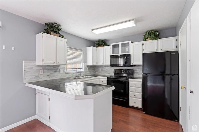 1464 S 1650 E, Ogden, UT 84404 - kitchen featuring black appliances, a sink, a peninsula, decorative backsplash, and white cabinets