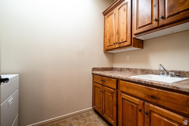 2710 W 410 N, Hurricane, UT 84737 - washroom with baseboards and cabinet space