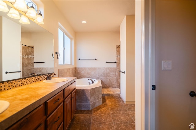 2710 W 410 N, Hurricane, UT 84737 - bathroom featuring tiled shower, a bath, double vanity, and tile patterned floors
