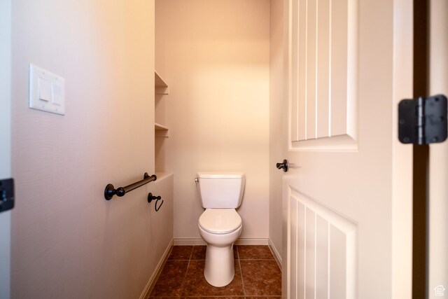 2710 W 410 N, Hurricane, UT 84737 - bathroom featuring toilet, baseboards, and tile patterned flooring