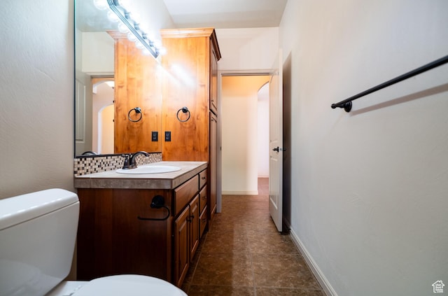 2710 W 410 N, Hurricane, UT 84737 - half bathroom with toilet, vanity, and baseboards