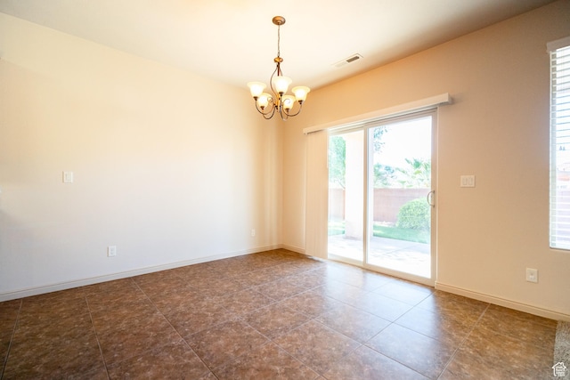 2710 W 410 N, Hurricane, UT 84737 - tiled empty room with a chandelier and baseboards