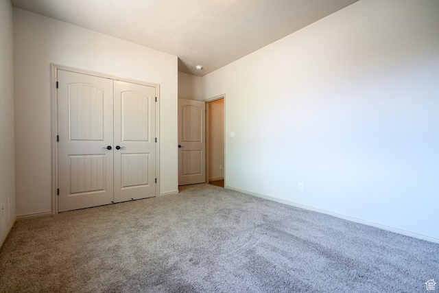 2710 W 410 N, Hurricane, UT 84737 - unfurnished bedroom with carpet, a closet, and baseboards