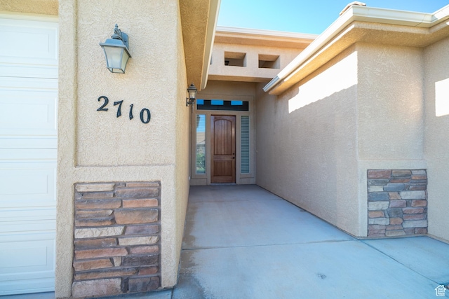 2710 W 410 N, Hurricane, UT 84737 - doorway to property with stucco siding