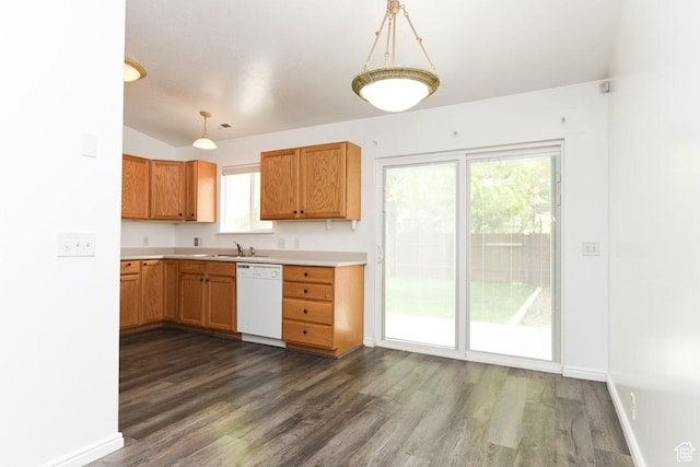 635 E Hunter Way N, Grantsville, UT 84029 - kitchen with white dishwasher, dark wood-style floors, light countertops, a sink, and baseboards