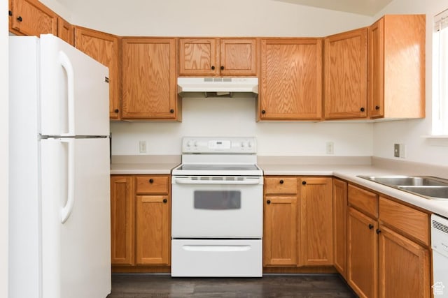 635 E Hunter Way N, Grantsville, UT 84029 - kitchen featuring white appliances, under cabinet range hood, light countertops, and dark wood finished floors