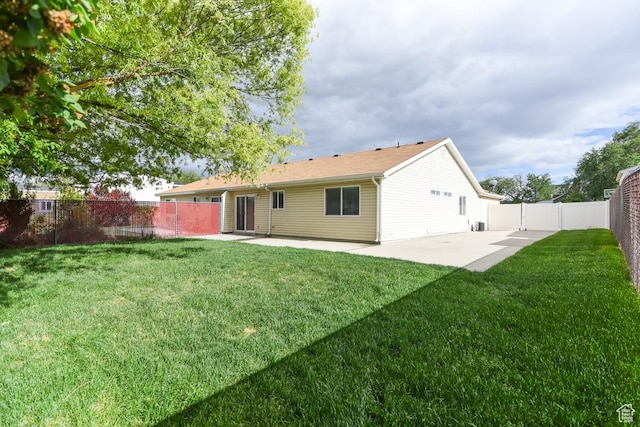 635 E Hunter Way N, Grantsville, UT 84029 - rear view of house with a patio
