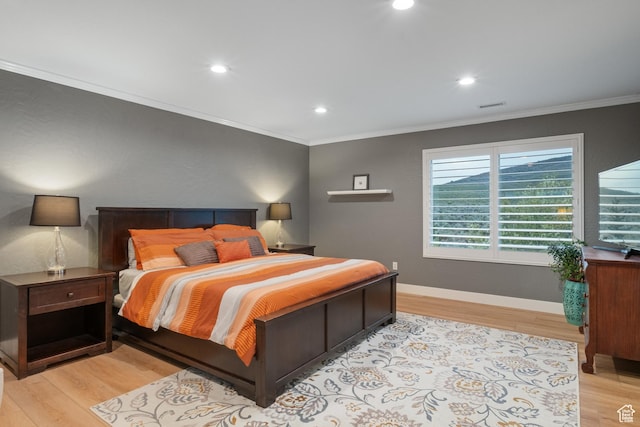 1288 E Foxcrest Ct, Park City, UT 84098 - bedroom with crown molding, light wood-style flooring, recessed lighting, and baseboards