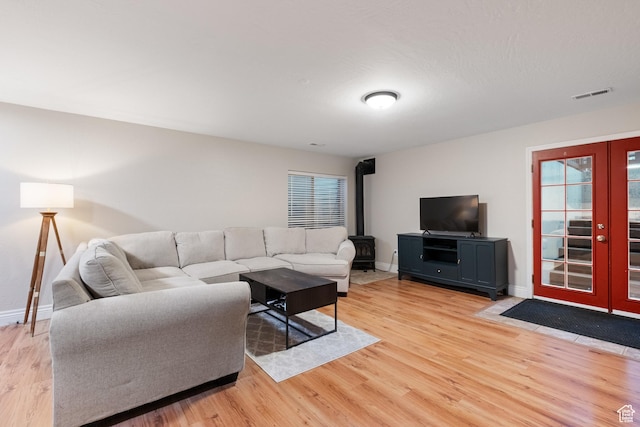1288 E Foxcrest Ct, Park City, UT 84098 - living area featuring french doors, light wood-type flooring, and baseboards