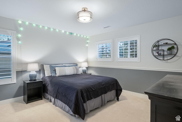 1288 E Foxcrest Ct, Park City, UT 84098 - bedroom featuring light carpet, multiple windows, and baseboards