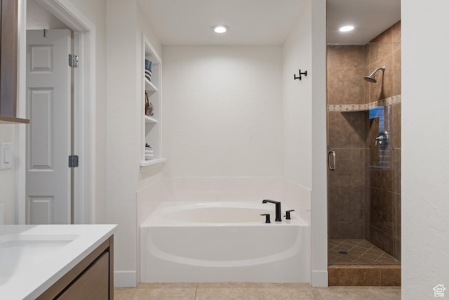 1288 E Foxcrest Ct, Park City, UT 84098 - bathroom with a stall shower, a garden tub, vanity, tile patterned flooring, and recessed lighting