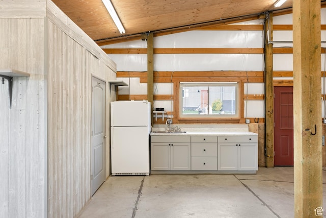 5685 N State Road 32, Peoa, UT 84061 - kitchen featuring freestanding refrigerator, concrete flooring, a sink, light countertops, and gray cabinets