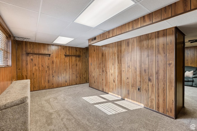 5685 N State Road 32, Peoa, UT 84061 - below grade area with carpet, wood walls, and a drop ceiling