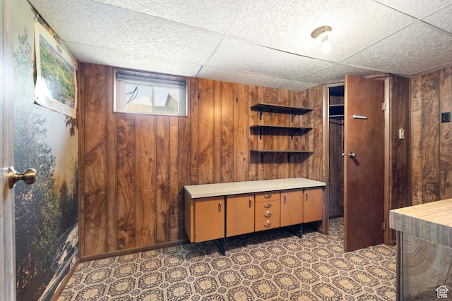 5685 N State Road 32, Peoa, UT 84061 - below grade area featuring tile patterned floors and wood walls
